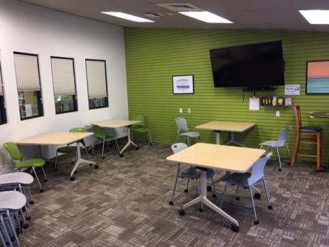 Image showing the Morro Bay meeting room with a conference table and wall-mounted TV.