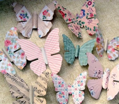 Photo of butterflys made out of paper.