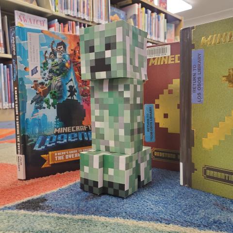 creeper with books