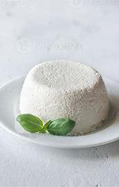 Plate of Ricotta Cheese with a single green garnish.