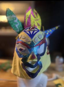 A face mask made from multicolored materials. 
