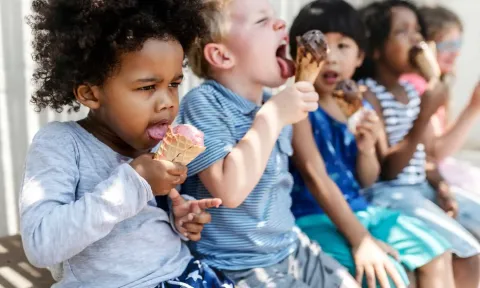 five kids eating ice cream