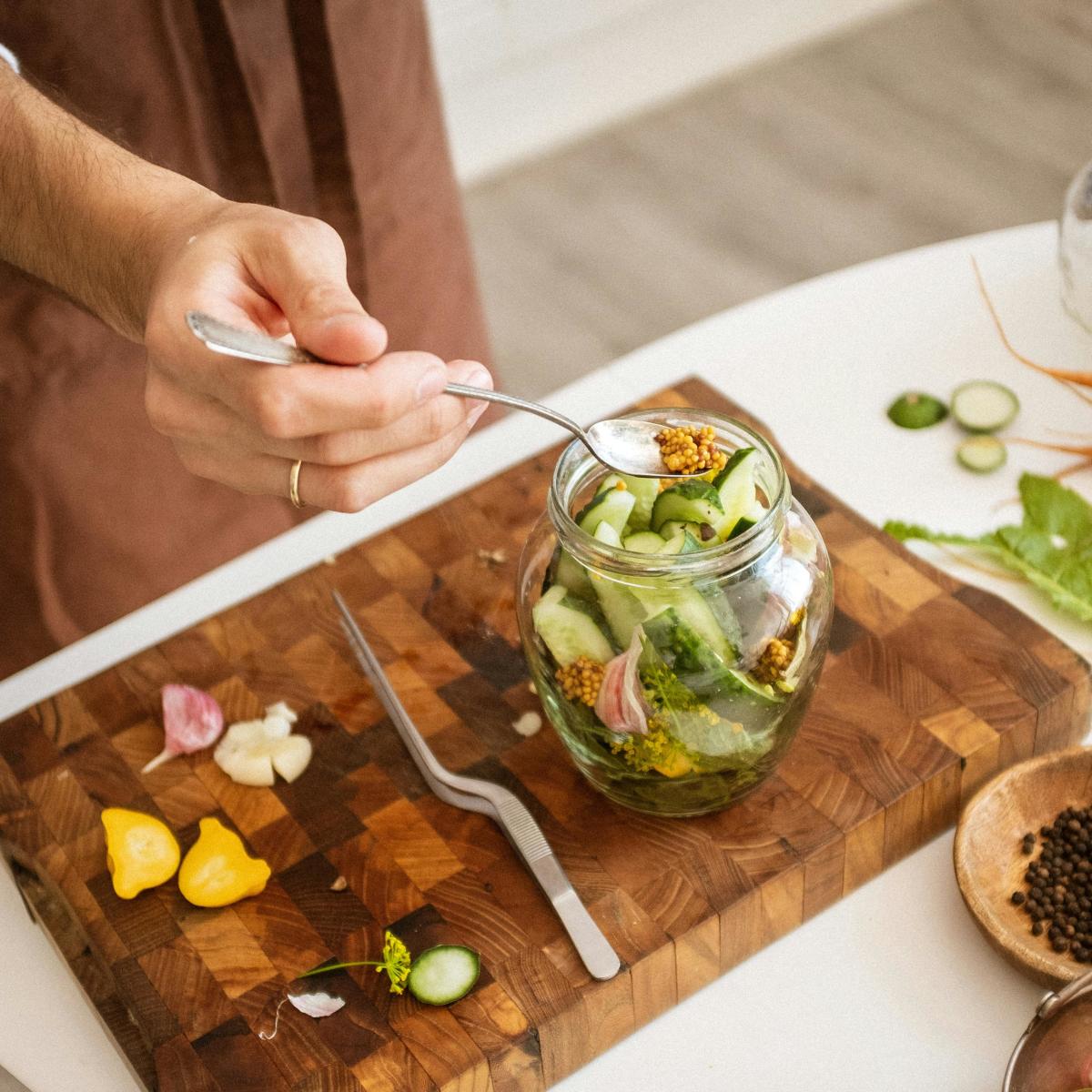 person making pickles